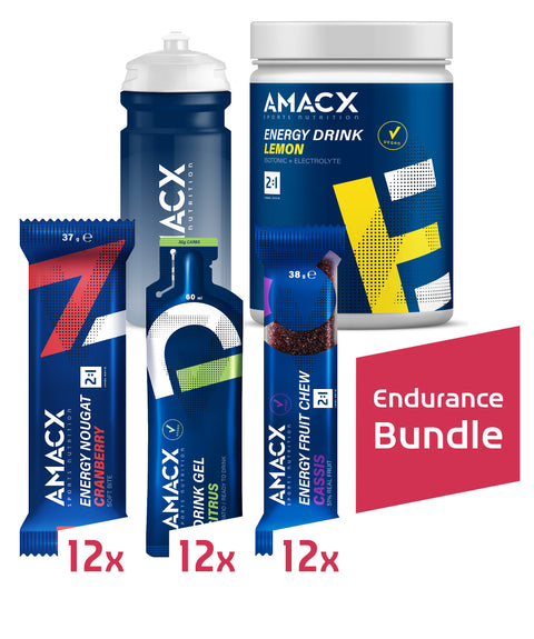 Imagen del paquete Amacx Endurance Bundle de Amacx.com, ideal para la nutrición deportiva. El paquete incluye una botella de agua, un polvo energético con sabor a limón y una variedad de barras energéticas, geles y caramelos masticables de frutas (12 de cada uno) para mantener tus niveles de energía durante actividades intensas.